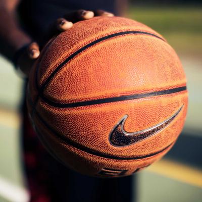 hand holding basketball